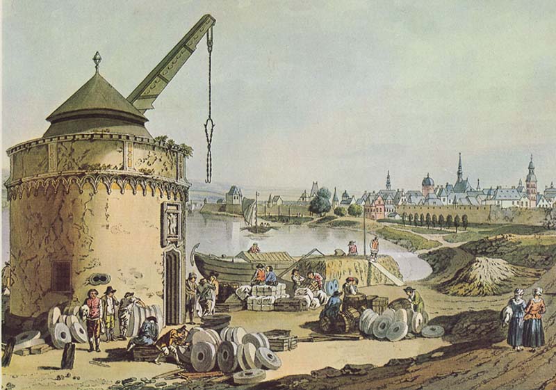 A fascinating 1792 engraving of the old treadmill crane at Andernach, Germany, on the banks of the Rhine. Stacks of Cullen millstones are in front of the crane, awaiting transfer to their shipping vessels.