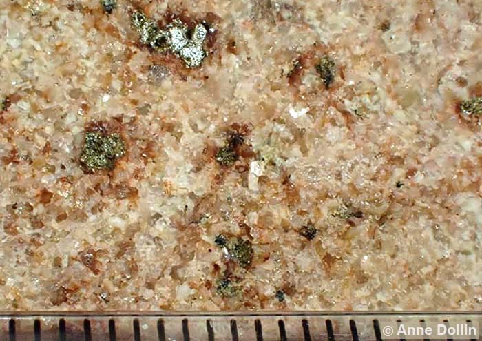 Macro photograph showing the large, colourful interlocking grains of granite rock from near Bathurst, NSW, Australia.