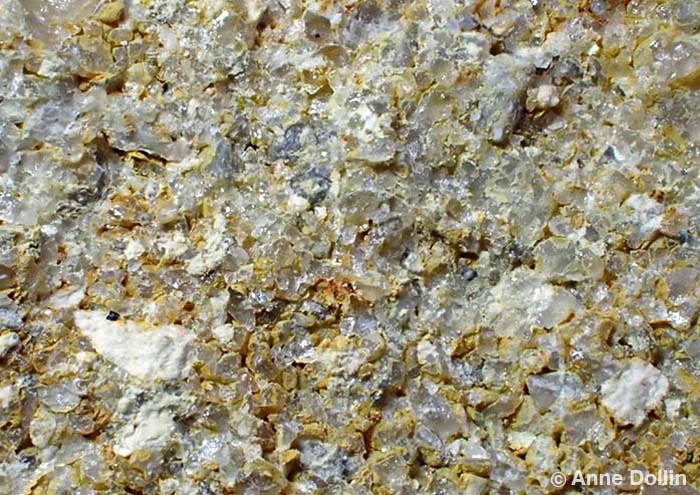Macro photograph of Millstone Grit from Lancashire. It has large interlocking abrasive grains.
